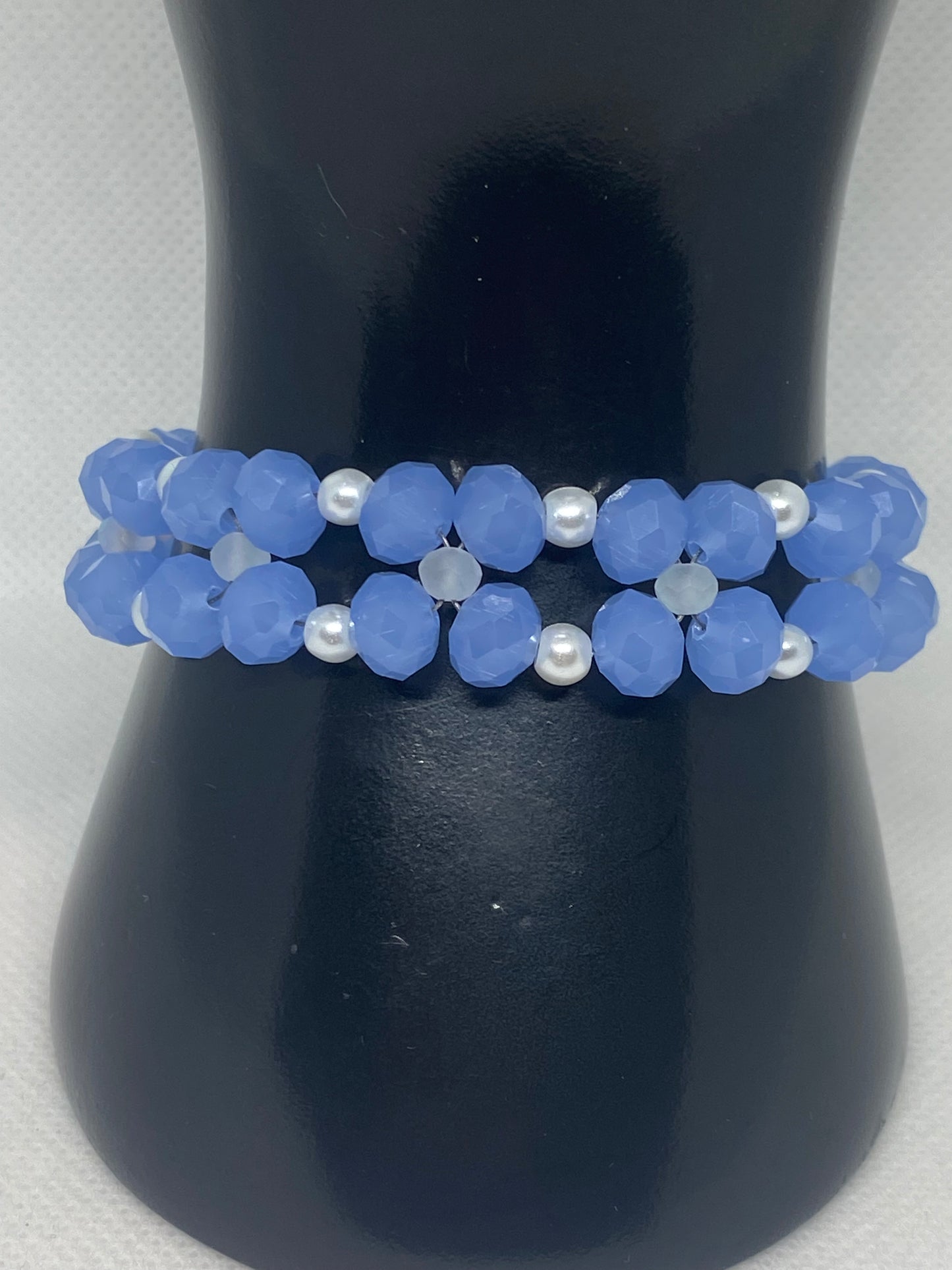 Sky Blue Crystal & Glass Pearl Beaded Bracelet with Silver Finished Stainless steel magnetic clasp.