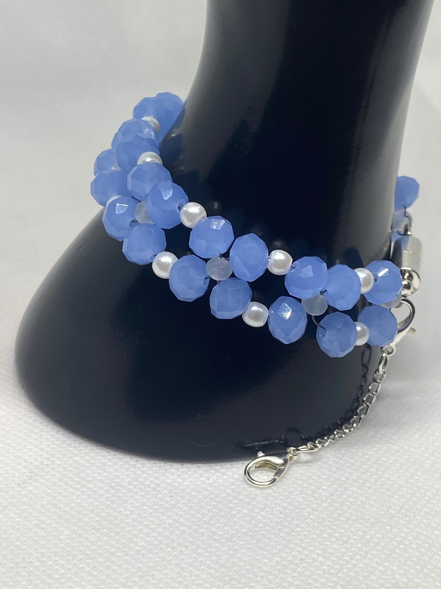 Sky Blue Crystal & Glass Pearl Beaded Bracelet with Silver Finished Stainless steel magnetic clasp.