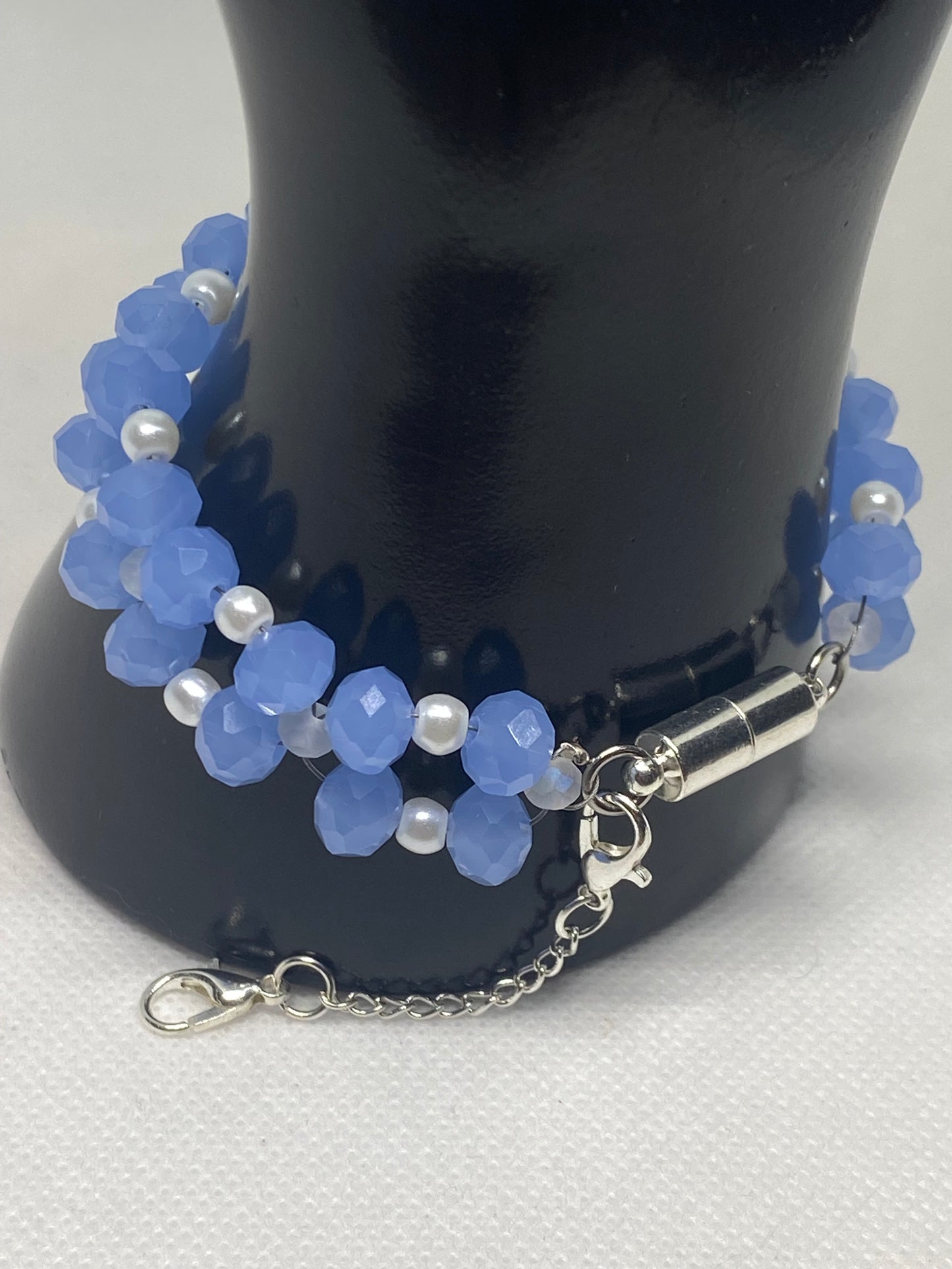 Sky Blue Crystal & Glass Pearl Beaded Bracelet with Silver Finished Stainless steel magnetic clasp.