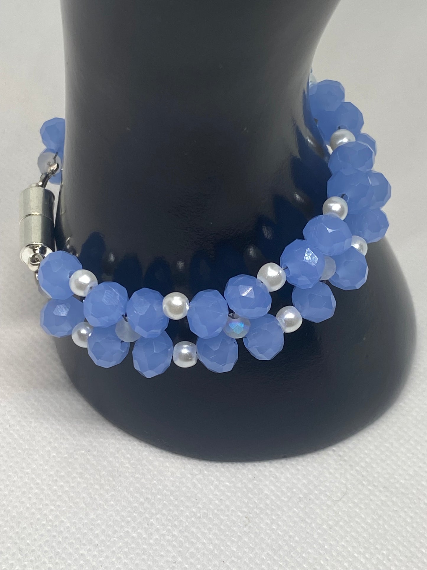 Sky Blue Crystal & Glass Pearl Beaded Bracelet with Silver Finished Stainless steel magnetic clasp.