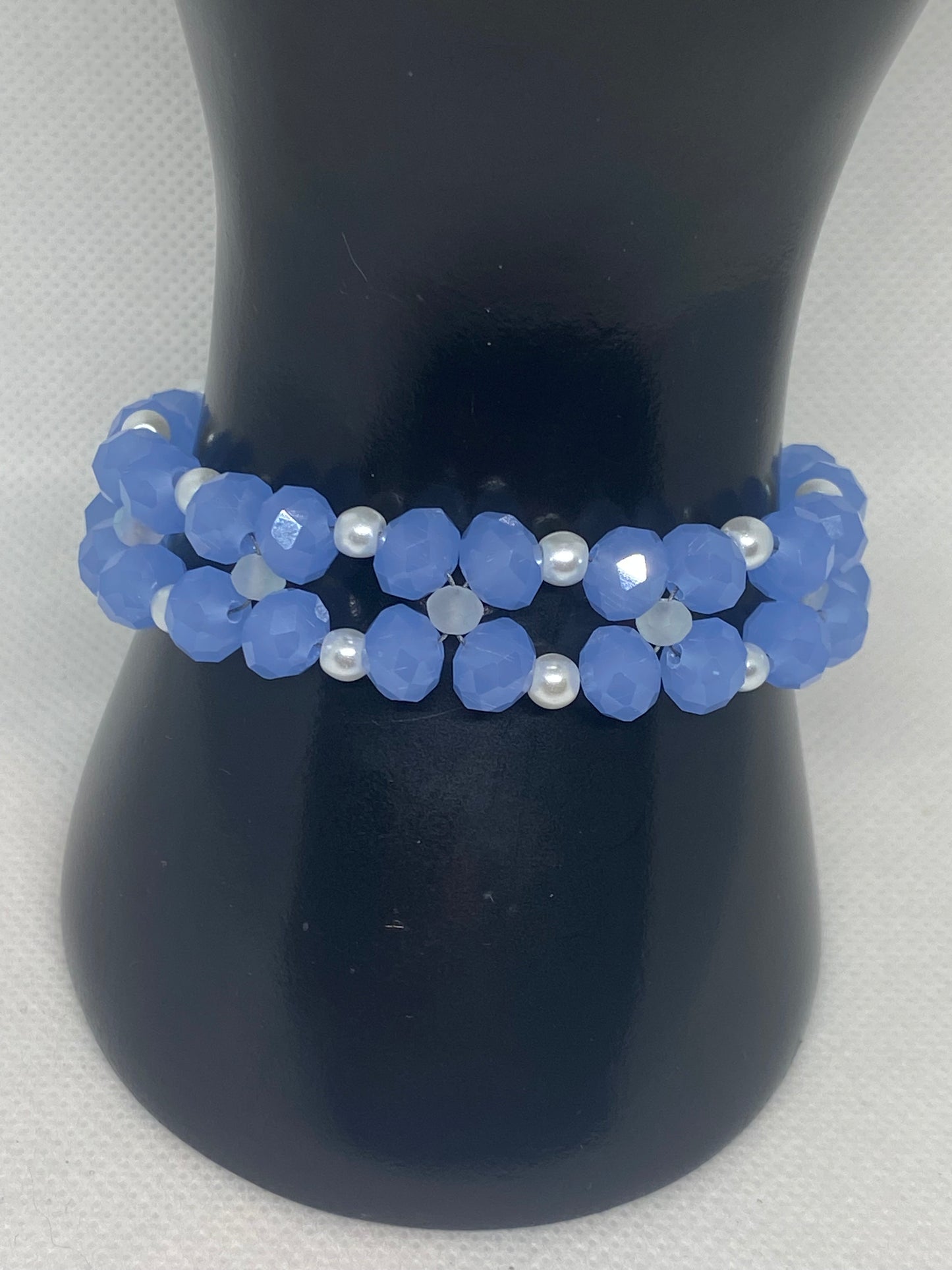 Sky Blue Crystal & Glass Pearl Beaded Bracelet with Silver Finished Stainless steel magnetic clasp.