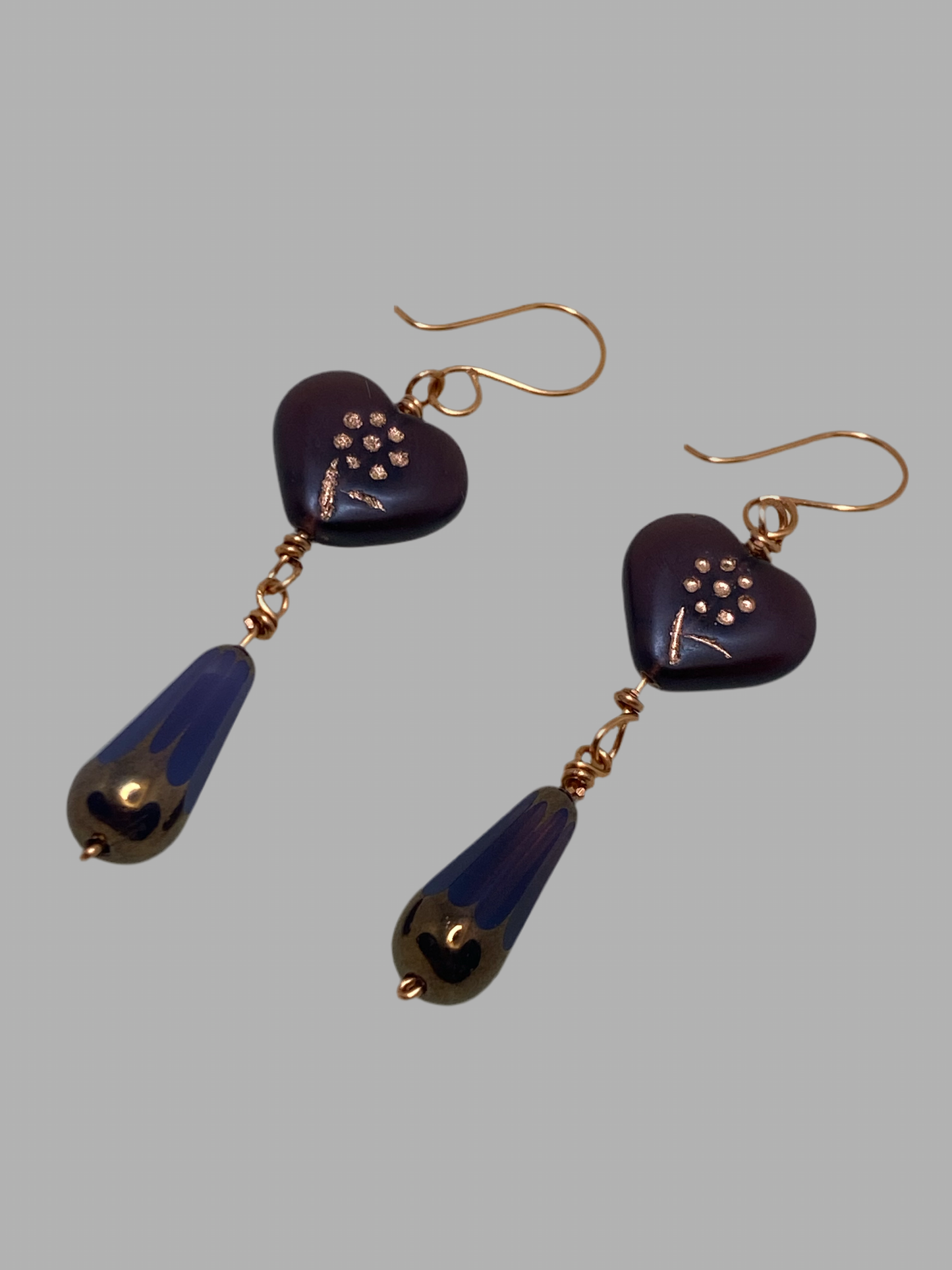 Artisan copper drop earrings featuring Deep Purple Glass Heart with etched Flower design