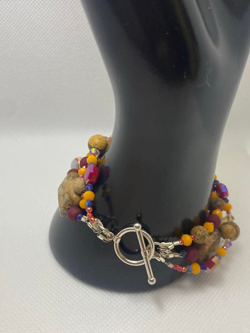 Arizona Sunset Bracelet Featuring: Picture Jasper, Red Jasper, Lapis Lazuli, Agate,, red colored Czech Glass Hibiscus Flower with Swarovski Crystals, & Sterling Silver toggle clasp