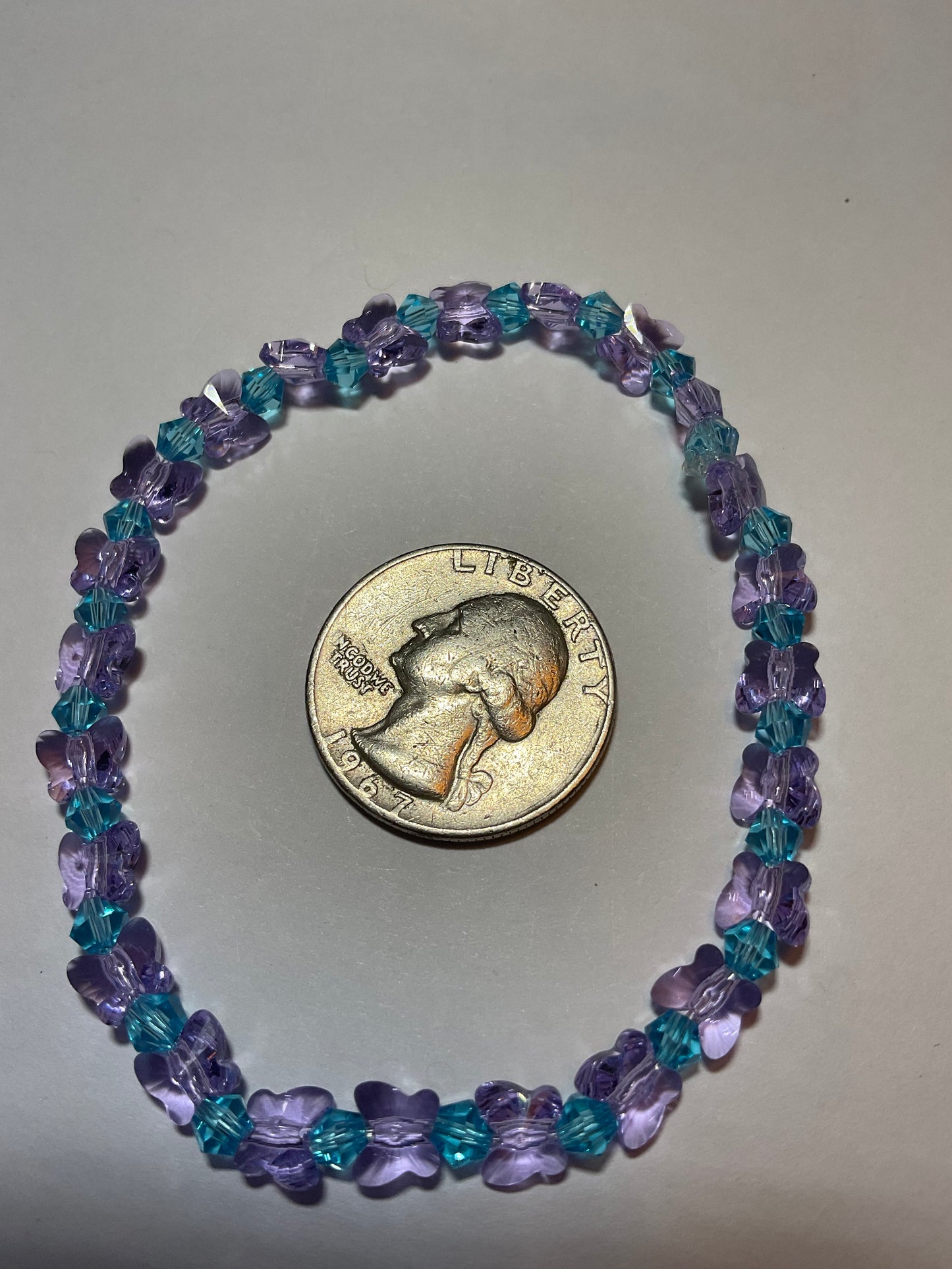 Artisan made Violet Butterfly & Aquamarine crystal Stretch bracelet. Handmade in Michigan!. Made using Swarovski Violet Butterfly Crystals.