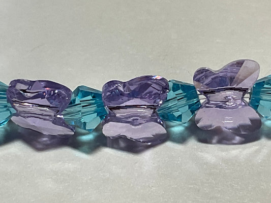 Artisan made Violet Butterfly & Aquamarine crystal Stretch bracelet. Handmade in Michigan!. Made using Swarovski Violet Butterfly Crystals.