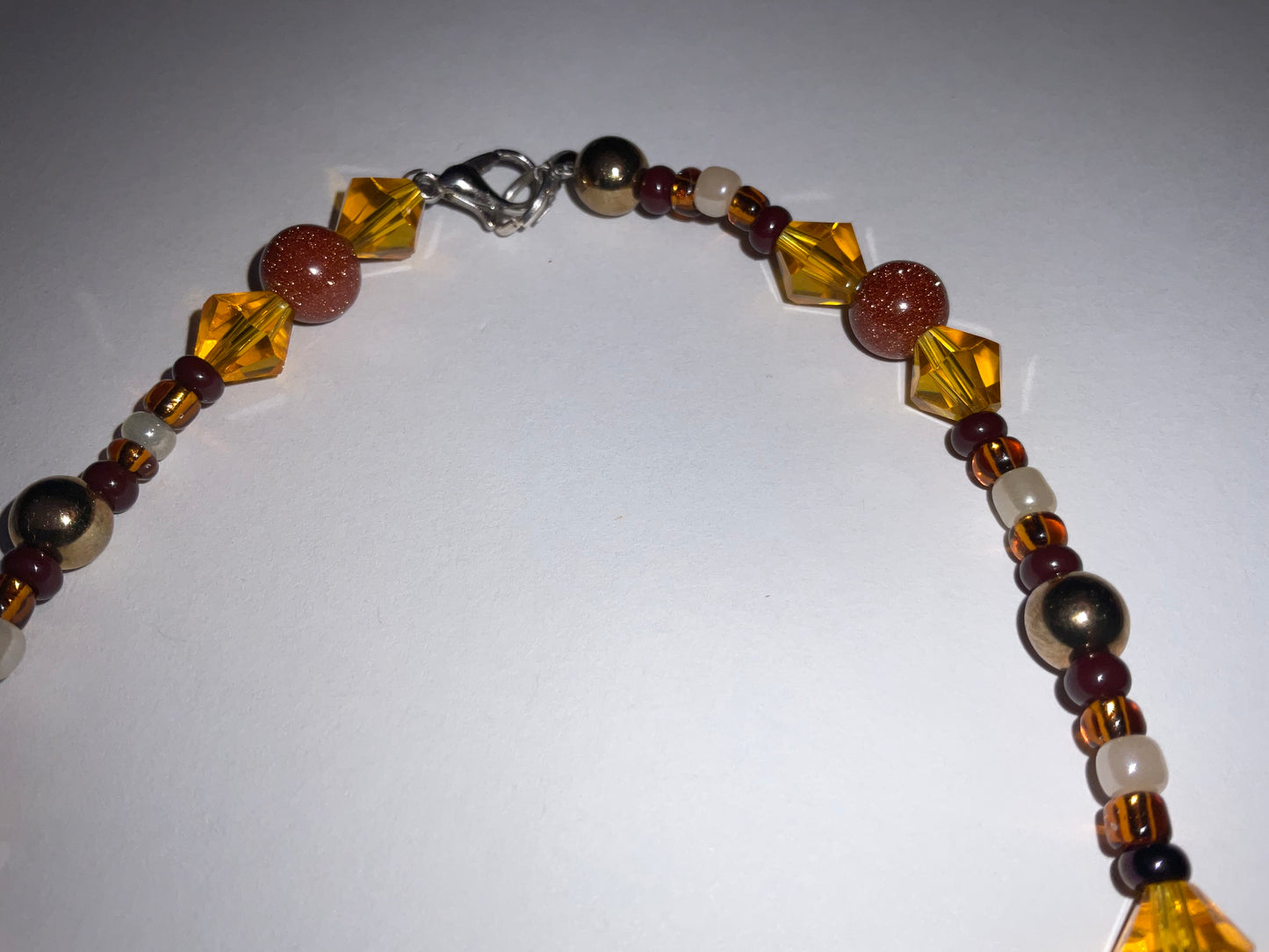 Artisan crafted Positive Energy necklace featuring Tigers eye gemstones, & Sparkling Crystals