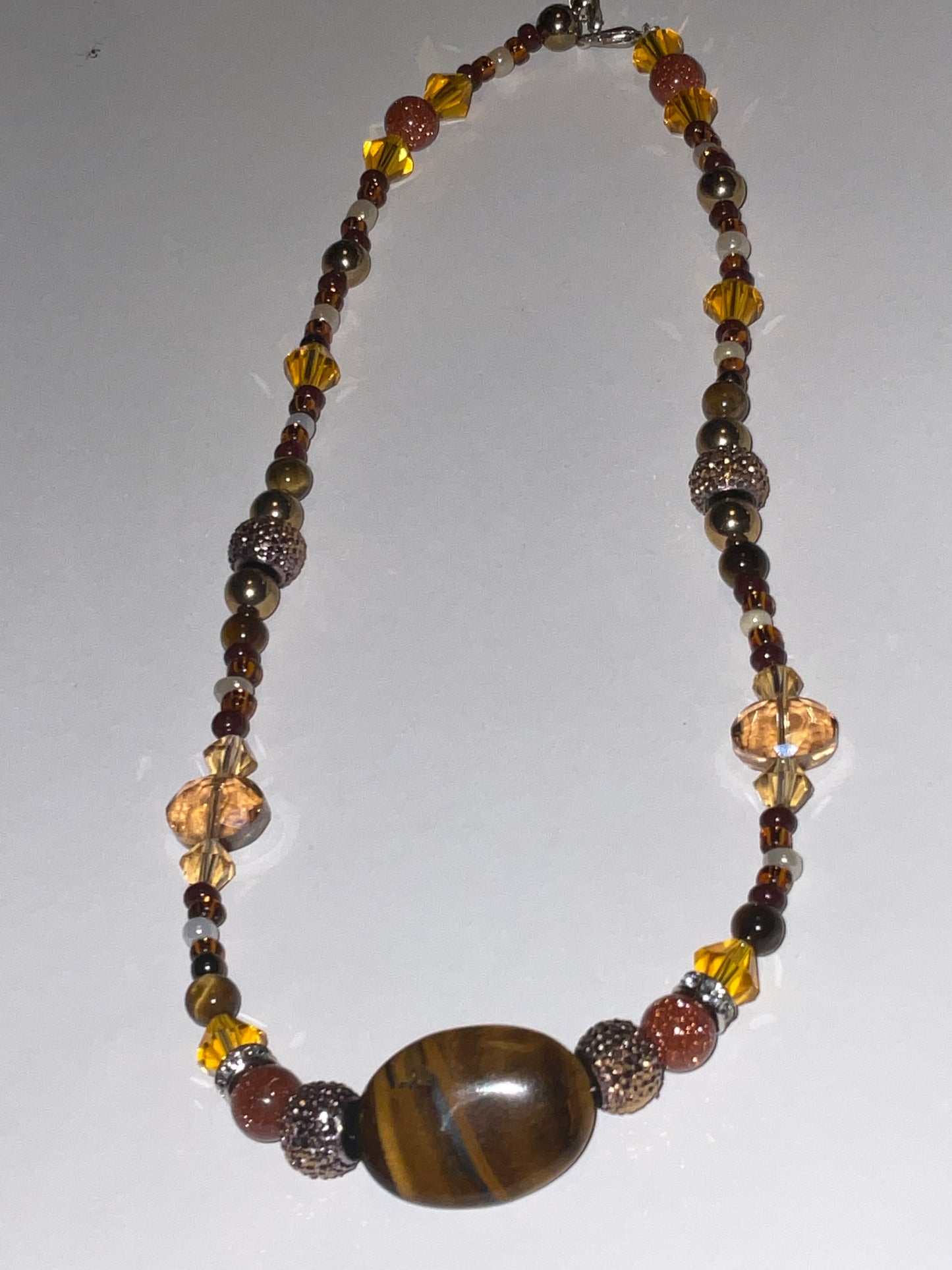 Artisan crafted Positive Energy necklace featuring Tigers eye gemstones, & Sparkling Crystals