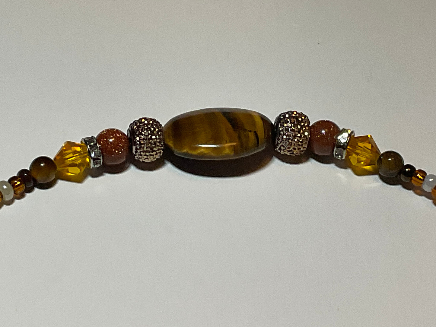 Artisan crafted Positive Energy necklace featuring Tigers eye gemstones, & Sparkling Crystals