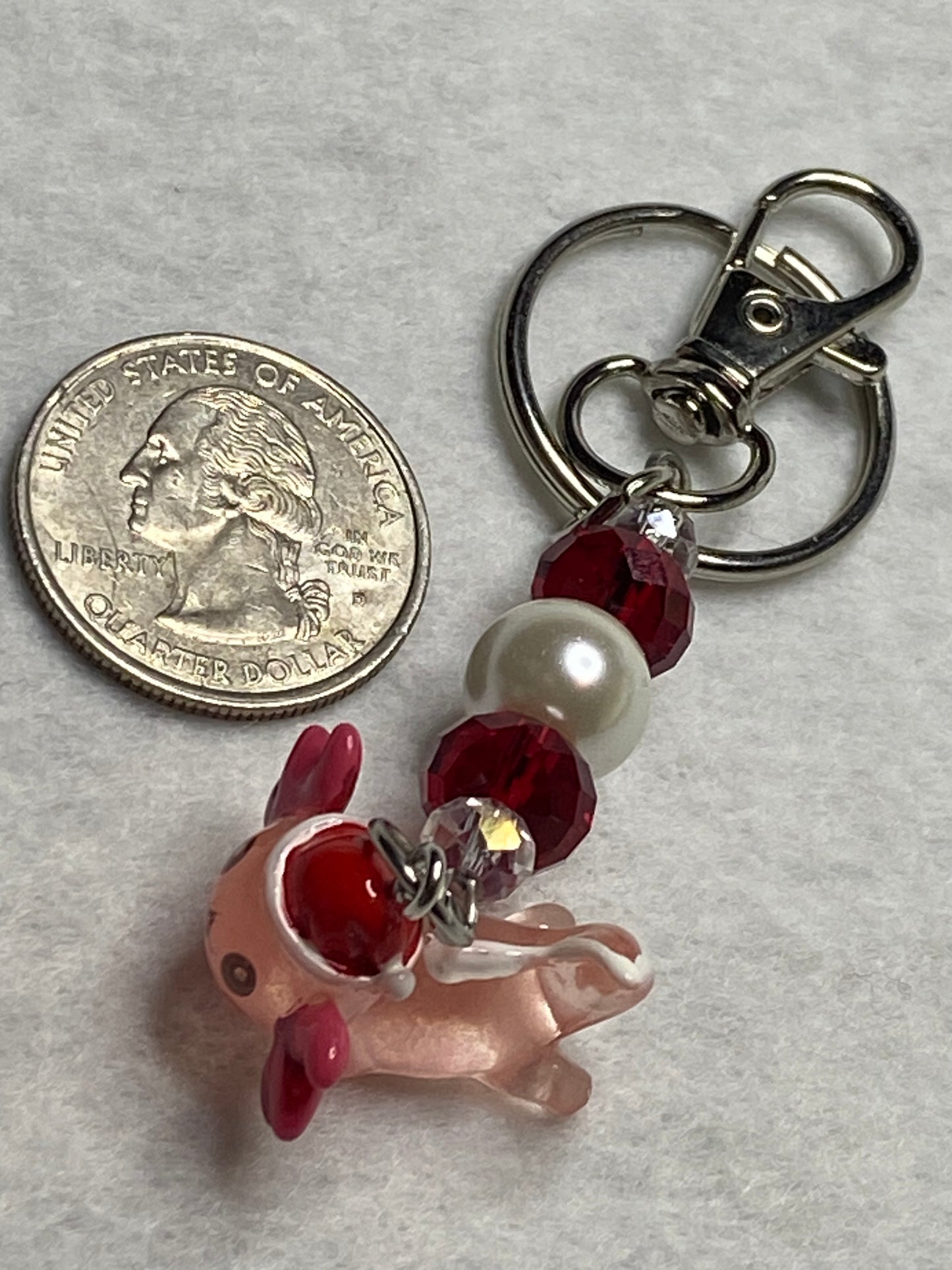 Adorable Axolotl w/Santa hat featuring stainless steel wire adorned with Sparkling Clear, & Red Crystals & Glass Pearls, Beautiful & Fun keychain/backpack/purse/tote charm