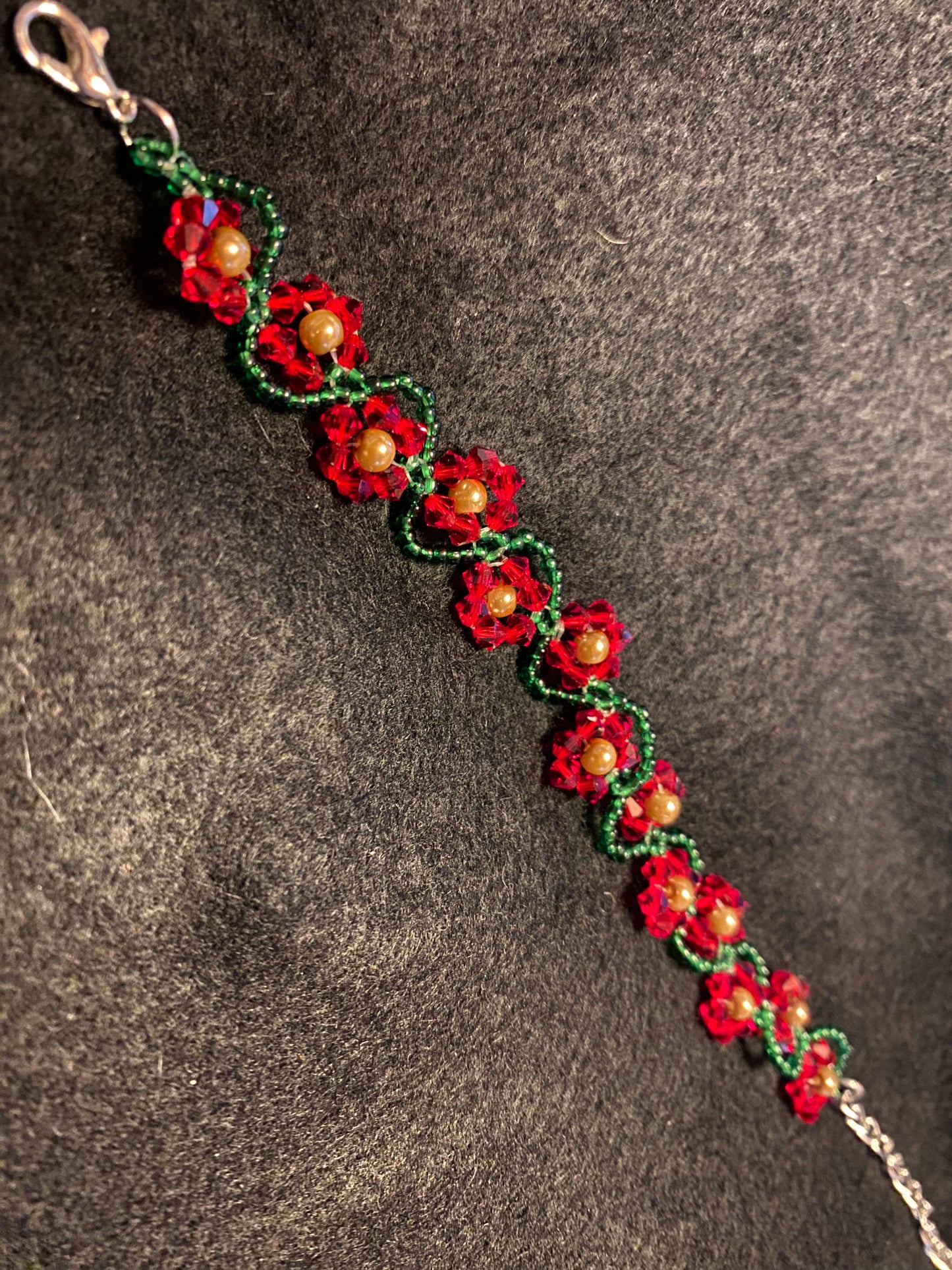 Artisan crafted Red Precosia Crystal Beaded Poinsettia Bracelet