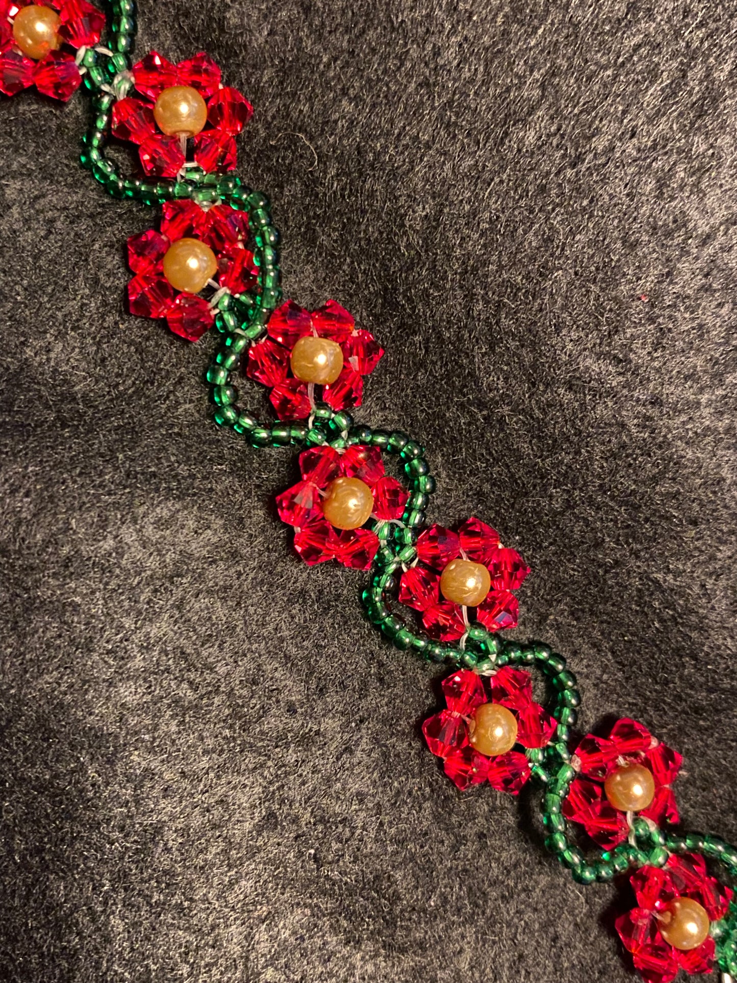 Artisan crafted Red Precosia Crystal Beaded Poinsettia Bracelet