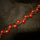 Artisan crafted Red Precosia Crystal Beaded Poinsettia Bracelet