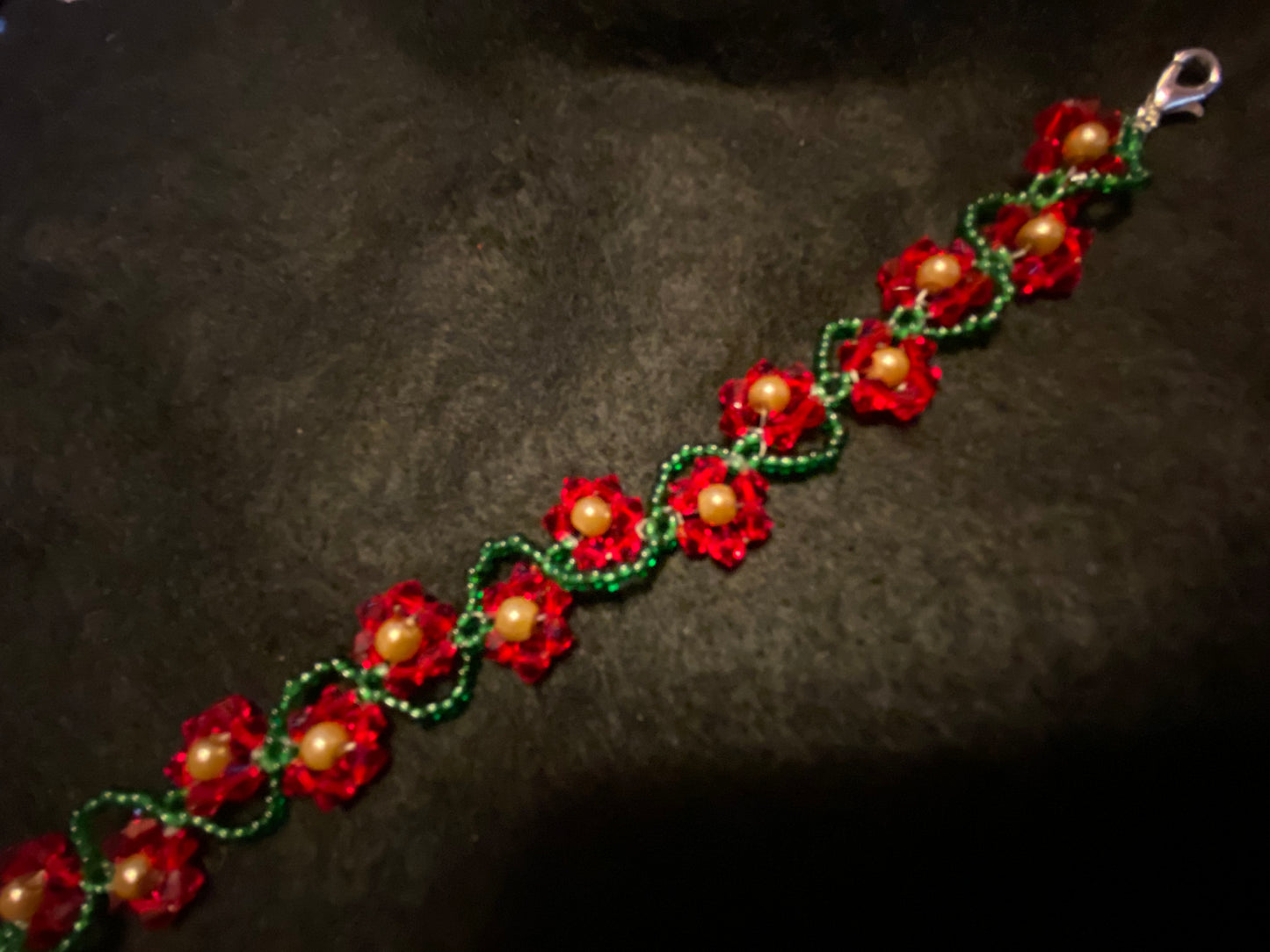 Artisan crafted Red Precosia Crystal Beaded Poinsettia Bracelet