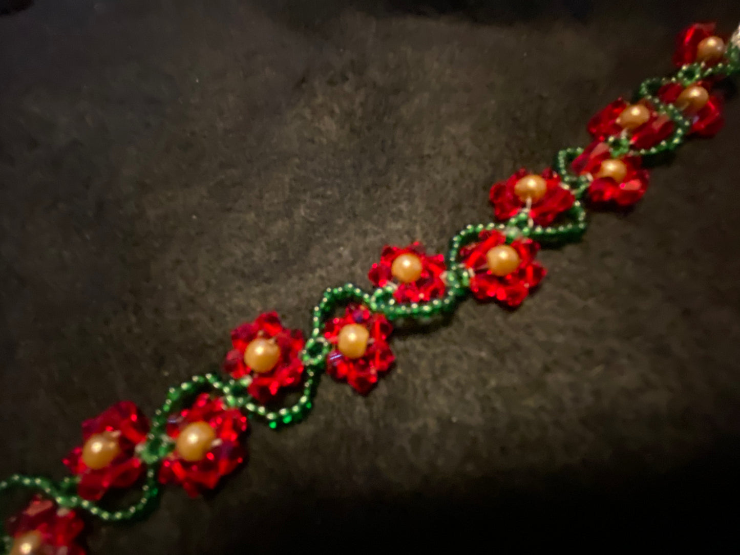 Artisan crafted Red Precosia Crystal Beaded Poinsettia Bracelet