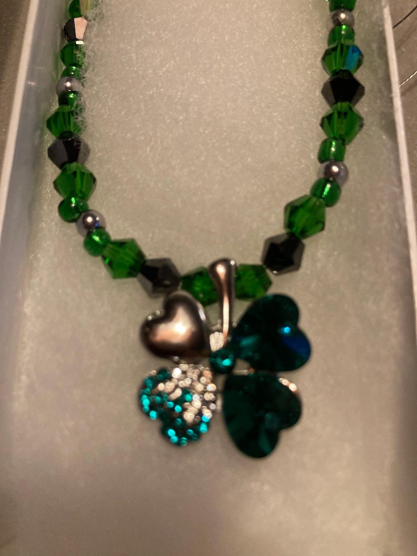 Emerald Green Crystals, Jet black Crystals, &  Silver Alloy 4 leaf Clover LuckyCharm necklace.