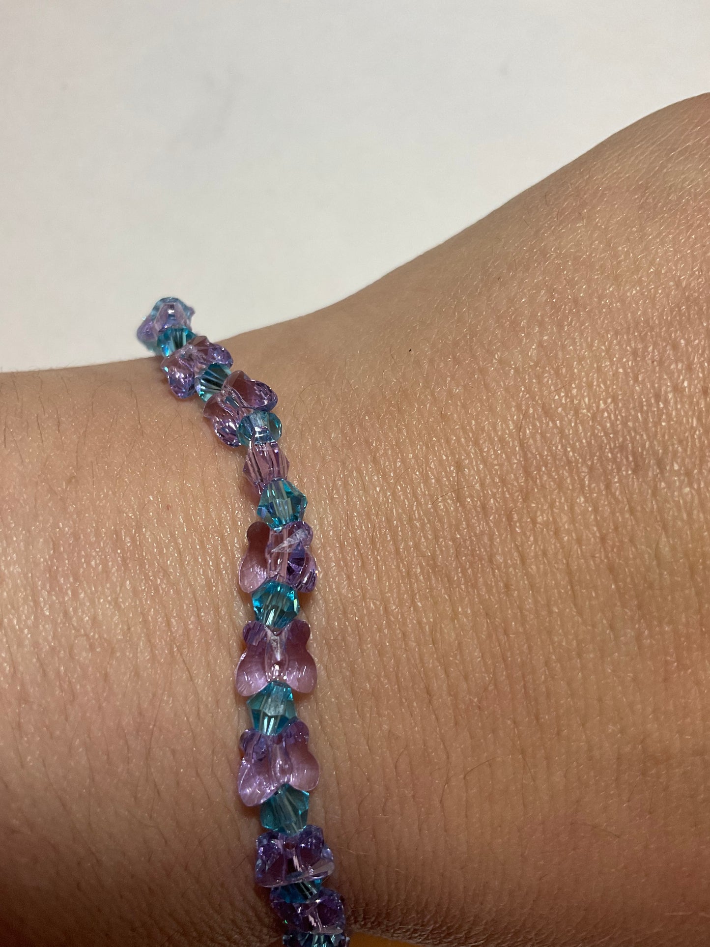 Artisan made Violet Butterfly & Aquamarine crystal Stretch bracelet. Handmade in Michigan!. Made using Swarovski Violet Butterfly Crystals.