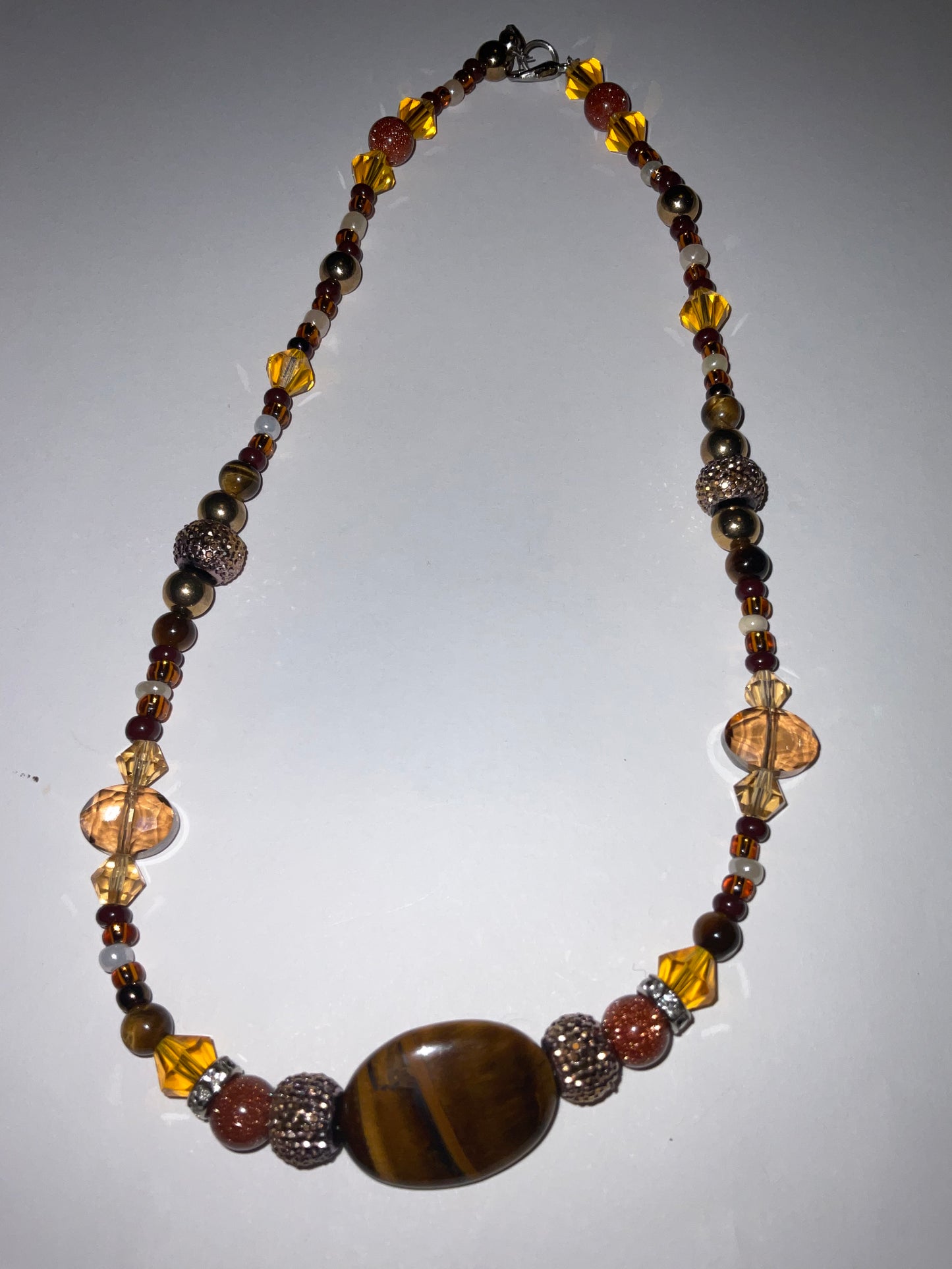 Artisan crafted Positive Energy necklace featuring Tigers eye gemstones, & Sparkling Crystals