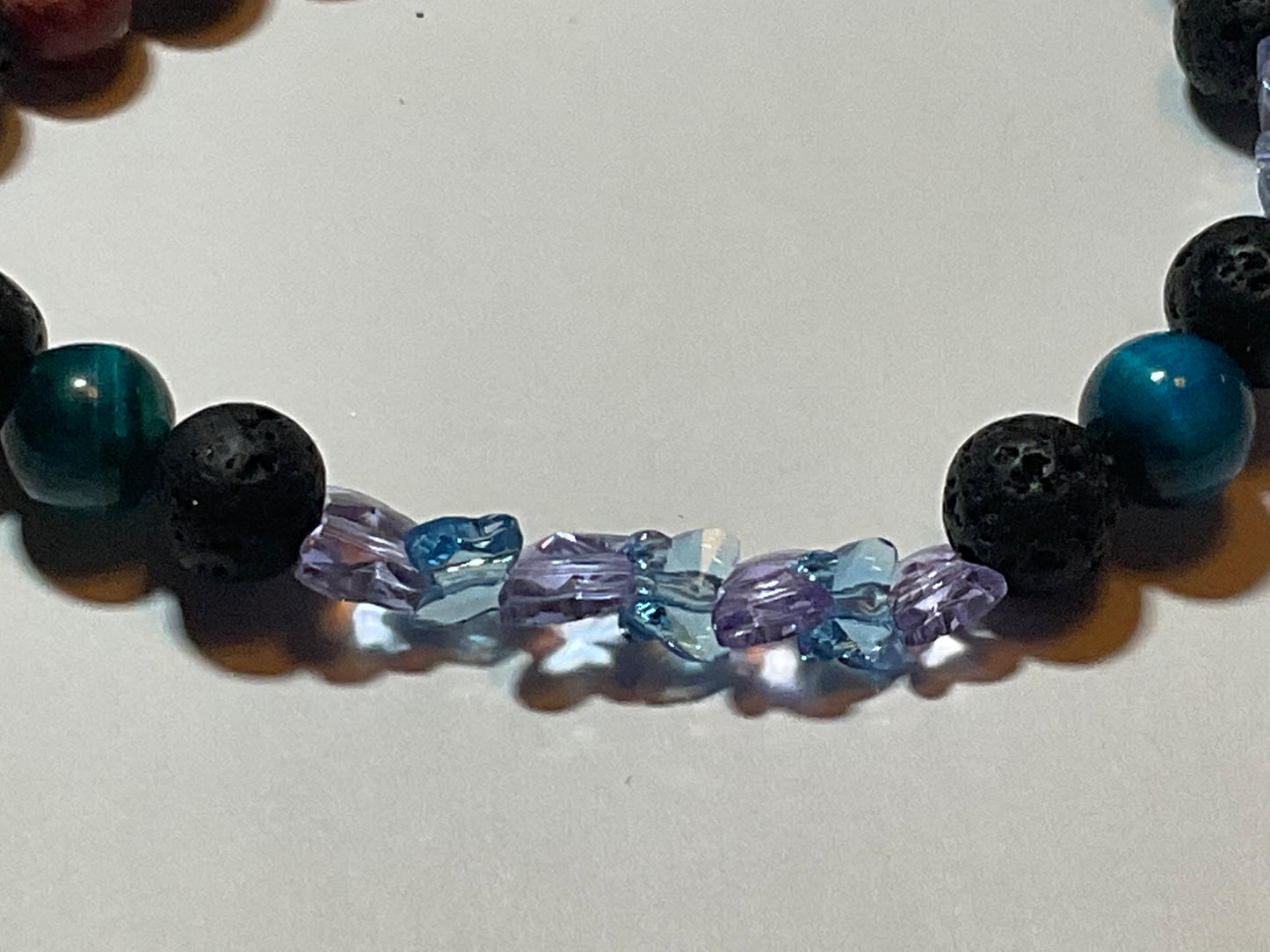 Artisan Semiprecious Stone Energy Stretch Bracelet with an added touch of dainty Swarovski Crystal Butterflies in Aqua & Violet