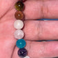 Artisan Semiprecious Stone Energy Stretch Bracelet with an added touch of dainty Swarovski Crystal Butterflies in Aqua & Violet