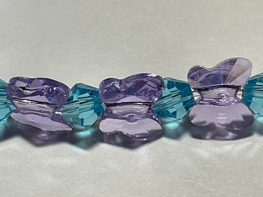 Artisan made Violet Butterfly & Aquamarine crystal Stretch bracelet. Handmade in Michigan!. Features Elegant Swarovski Violet Butterfly Crystals!