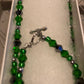 Emerald Green Crystals, Jet black Crystals, &  Silver Alloy 4 leaf Clover LuckyCharm necklace.