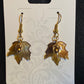 24Kt Gold Plated Acorn and Hand Painted Acrylic Maple Leaf Dangle Earrings.